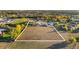 Aerial view of large lot with a house and outbuildings at 9941 Ammons Cir, Broomfield, CO 80021