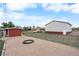 Large backyard with gravel play area and storage shed at 9941 Ammons Cir, Broomfield, CO 80021