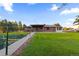 Landscaped backyard with garden and large lawn at 9941 Ammons Cir, Broomfield, CO 80021
