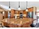 Modern kitchen boasts a copper-topped island and stainless steel appliances at 9941 Ammons Cir, Broomfield, CO 80021