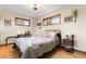 Bright bedroom with a double bed and hardwood floors at 9941 Ammons Cir, Broomfield, CO 80021
