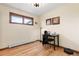 Home office with hardwood floors and window at 9941 Ammons Cir, Broomfield, CO 80021