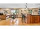 Open concept kitchen with island seating and views to the backyard at 9941 Ammons Cir, Broomfield, CO 80021