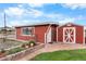 Red storage shed with a smaller shed next to it at 9941 Ammons Cir, Broomfield, CO 80021