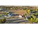 Aerial view of property, showing home, detached garage and large lot at 9941 Ammons Cir, Broomfield, CO 80021