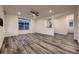 Spacious living room with hardwood floors and ceiling fan at 9307 Inca Dove Cir, Littleton, CO 80125