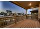 Covered porch overlooking a quiet residential neighborhood at 9307 Inca Dove Cir, Littleton, CO 80125
