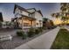 Two story house exterior with front porch and landscaping at 9307 Inca Dove Cir, Littleton, CO 80125