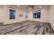 Bright living room with hardwood floors and large windows at 9307 Inca Dove Cir, Littleton, CO 80125