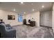 Charming loft with gray carpet, a home office setup, and ample natural light at 9307 Inca Dove Cir, Littleton, CO 80125