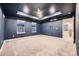 Spacious bedroom with blue walls and ceiling fan at 9307 Inca Dove Cir, Littleton, CO 80125