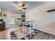 Bright dining room with sliding glass door leading to backyard at 419 Johnson Dr, Castle Rock, CO 80104