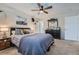 Cozy bedroom featuring a ceiling fan and dresser at 419 Johnson Dr, Castle Rock, CO 80104