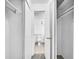 Bathroom with toilet and closets on either side at 14751 E Tennessee Dr # 225, Aurora, CO 80012