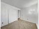 Spacious bedroom with mirrored closet doors at 14751 E Tennessee Dr # 225, Aurora, CO 80012