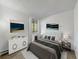 Bedroom with a queen bed and window at 14751 E Tennessee Dr # 225, Aurora, CO 80012