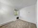 Empty bedroom with carpet and window at 14751 E Tennessee Dr # 225, Aurora, CO 80012