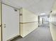 Building hallway with apartment doors at 14751 E Tennessee Dr # 225, Aurora, CO 80012