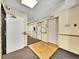 Building hallway with elevator and fire safety at 14751 E Tennessee Dr # 225, Aurora, CO 80012