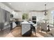 Bright kitchen with an island, stainless steel appliances, and a dining area at 10250 Dan Ct, Highlands Ranch, CO 80130