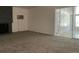 Bright living room with fireplace and carpet flooring at 2696 S Jersey St, Denver, CO 80222
