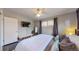 Bright bedroom with a comfortable bed and plenty of closet space at 28 W Broadmoor Dr, Littleton, CO 80120