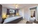 Main bedroom with king bed and ceiling fan at 28 W Broadmoor Dr, Littleton, CO 80120