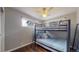 Bedroom with bunk beds and ceiling fan at 28 W Broadmoor Dr, Littleton, CO 80120