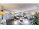 Living room with hardwood floors and a gray sectional sofa at 28 W Broadmoor Dr, Littleton, CO 80120
