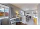 Open concept kitchen with a breakfast bar and ample counter space at 28 W Broadmoor Dr, Littleton, CO 80120