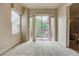 Spacious bedroom with sliding glass doors leading to a private balcony at 1488 Madison St # 211, Denver, CO 80206