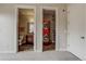 View of the laundry room and bathroom from the bedroom at 1488 Madison St # 211, Denver, CO 80206