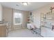 Charming bedroom with a workspace and built-in shelving at 16021 Williams Pl, Broomfield, CO 80023