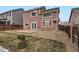 Two-story house exterior with backyard view at 4936 Stoneham Ave, Castle Rock, CO 80104