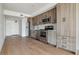 Modern kitchen with stainless steel appliances and wood cabinets at 3575 Chestnut Pl # 601, Denver, CO 80216