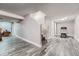 Finished basement with gray tile floor and staircase at 1099 S Naples Way, Aurora, CO 80017