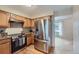 Well-equipped kitchen with stainless steel appliances at 1099 S Naples Way, Aurora, CO 80017