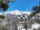 Stunning mountain view with ski slopes visible in winter at 102 S High St, Breckenridge, CO 80424