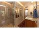 Elegant bathroom with double vanity, large shower, and built-in storage at 102 S High St, Breckenridge, CO 80424