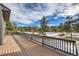 Deck overlooking a snowy wooded landscape at 1298 Silverheels Dr, Larkspur, CO 80118