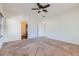 Spacious bedroom with carpeted floors and ceiling fan at 5620 Tumbleweed Ave, Firestone, CO 80504