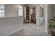 Full bathroom with shower/tub combo and linen storage at 13000 E 103Rd Ave, Commerce City, CO 80022