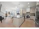 Modern kitchen with large island and stainless steel appliances at 415 East St # A, Louisville, CO 80027