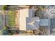 Aerial view showcasing house with backyard, deck, and driveway at 5241 S Shawnee St, Aurora, CO 80015