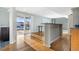 Finished basement with hardwood floors, bar, and backyard access at 5241 S Shawnee St, Aurora, CO 80015