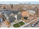 Aerial view of two-unit property with city skyline in background at 2901 W 4Th Ave, Denver, CO 80219