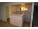 Basement bar area with a counter and mirrors at 15669 E Hamilton Pl, Aurora, CO 80013