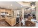 Gourmet kitchen with island, stainless steel appliances, and breakfast area at 8571 Windhaven Dr, Parker, CO 80134