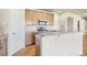 View of kitchen cabinets, countertops and appliances at 6846 S Quantock Way, Aurora, CO 80016