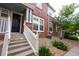 Townhouse entrance with stairs and landscaping at 22975 E Ontario Dr # 106, Aurora, CO 80016